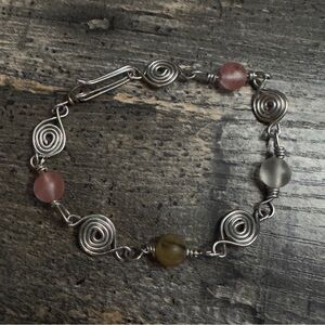 Elegant Silver Swirls and Cherry Quartz Beaded Bracelet